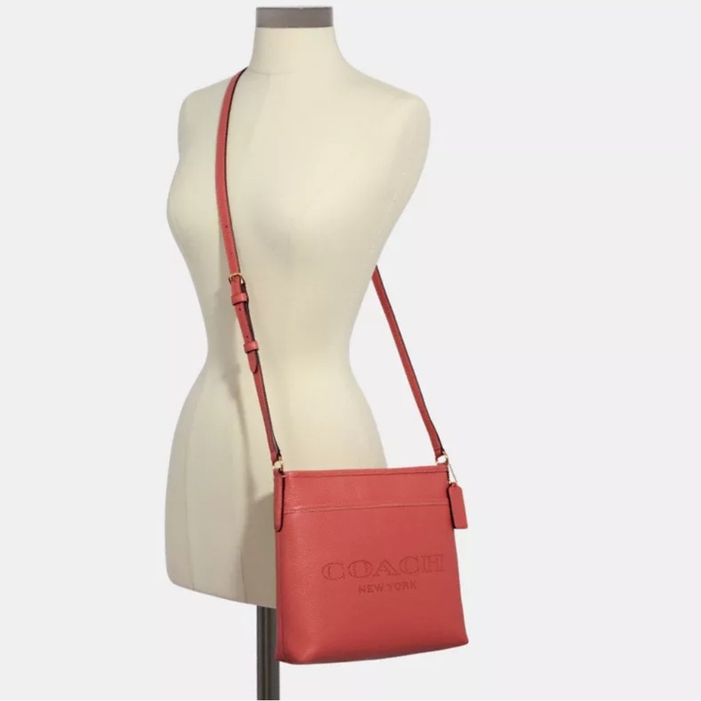 Coach File Crossbody
With Coach Print Coral Crossbody Woman’s  Bag